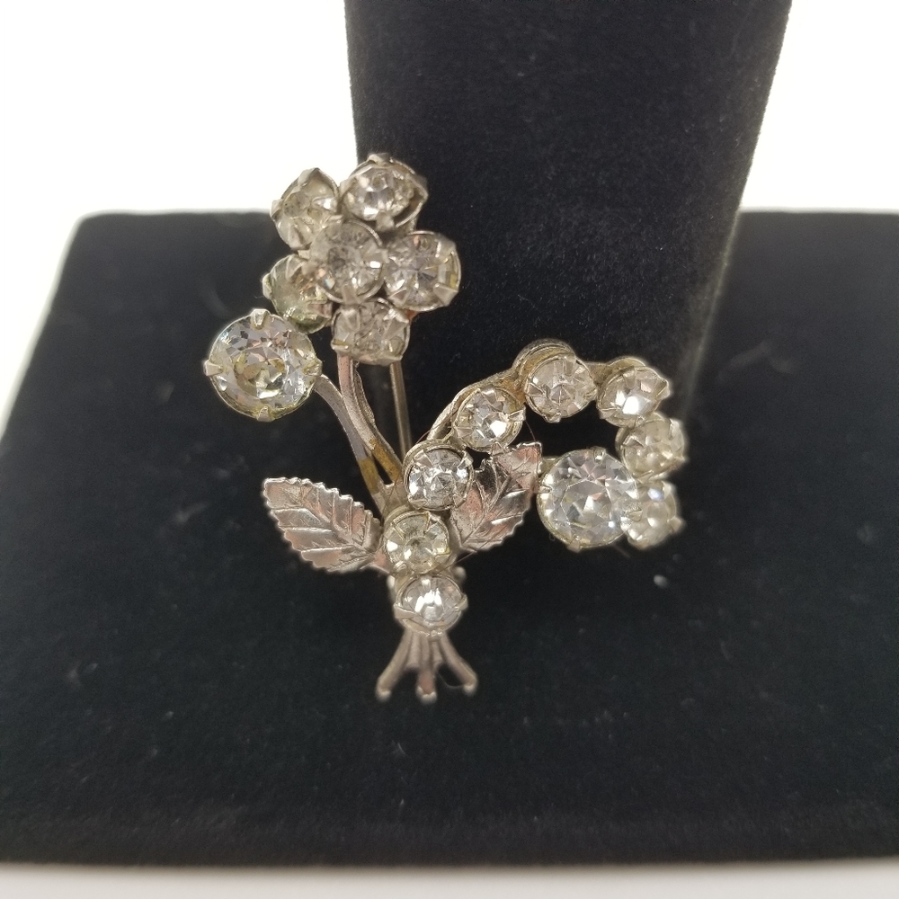 Clear rhinestones flowers silver tone brooch